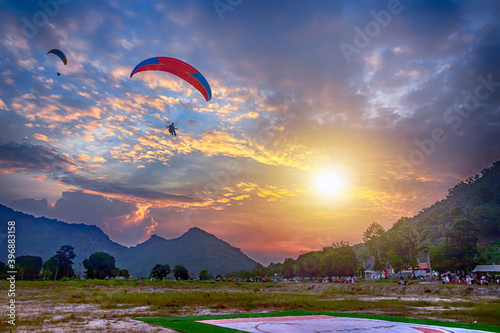 Paragliding during sunset in An Giang, Vietnam