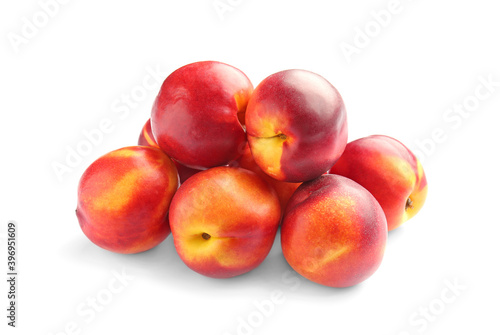 Sweet ripe peaches on white background