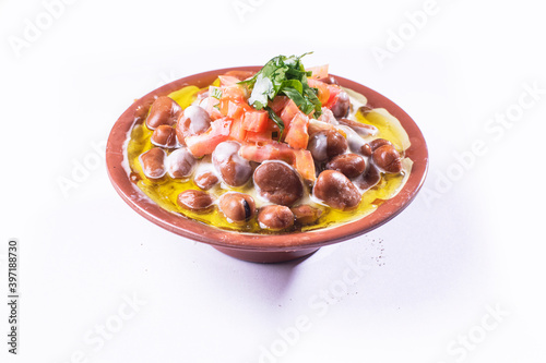 foul or ful Modammas Fava Beans Traditional Dish of Beans for all arab - White background 