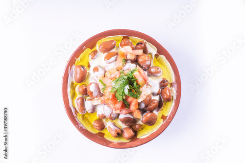 foul or ful Modammas Fava Beans Traditional Dish of Beans for all arab - White background 