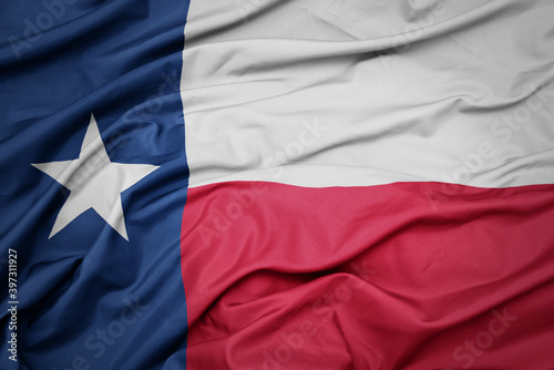 waving colorful flag of texas state.