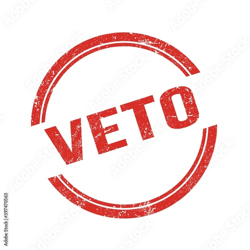 VETO text written on red grungy round stamp.