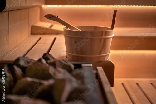 Sauna bucket in hot cosy sauna room - no people.