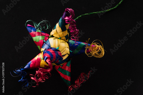 Portrait of a Colorful Mexican Pinata, black background