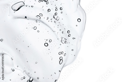 Transparent hyaluronic acid gel texture isolated on a white background.