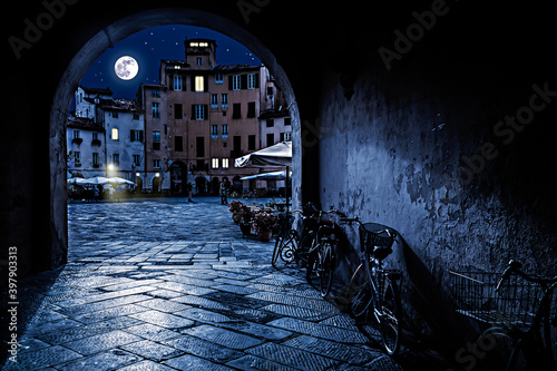 The Square of the Amphitheatre in Lucca, Itlay at Night with Full Moon