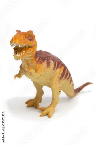 Tyrannosaurus plastic model toy in white background