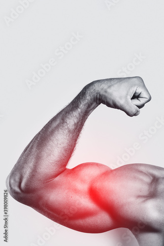 Muscular arm. Specialization for biceps training.