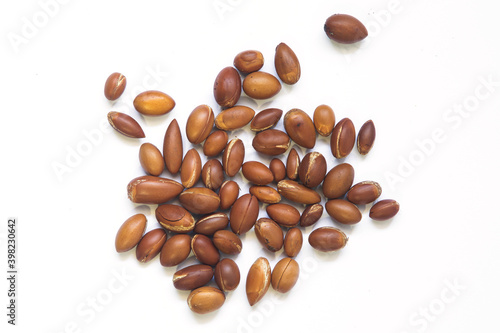 the nuts of the argan tree Argania spinosa on a white background. For the production of argan oil. 