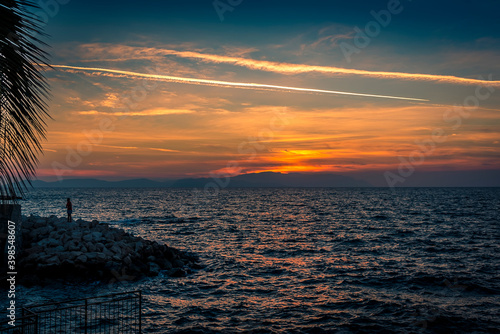 The sunset at Kusadasi, Turkey over the Mycale Strait towards the Greek island of Samos
