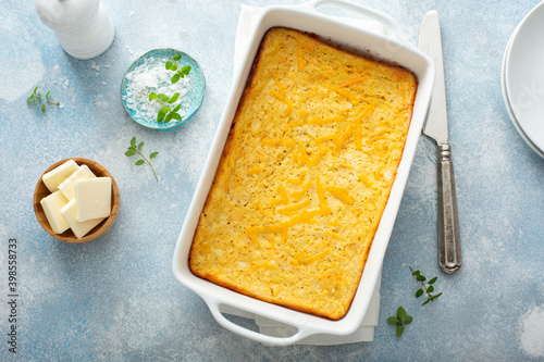 Cheesy cornbread freshly baked in a pan, southern food