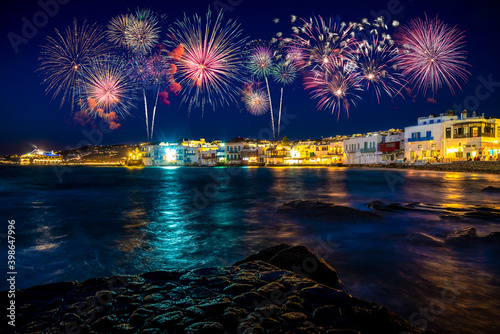 Fireworks display at Little Venice district of Mykonos island at night. Greece