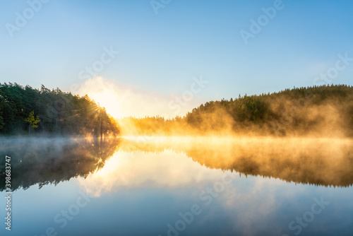 Sunrsise at the lake with morning fog