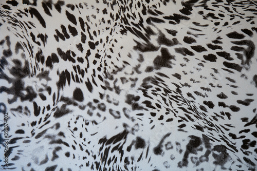 Black and white abstract camouflage. The concealment pattern on a fabric. Conception of winter masking.