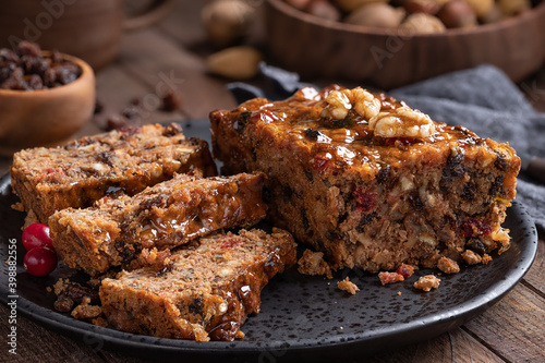 Fruitcake Loaf Sliced on a Plate