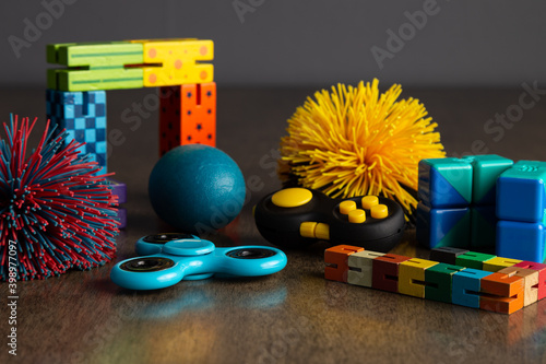 Childs fidget toys in different shapes, colors and styles. 