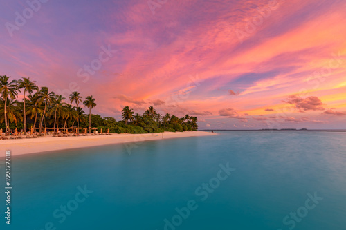 Aerial sunrise sunset bay view, colorful sky and clouds with amazing beach. Meditation relaxation tropical drone view sea ocean water. Aerial nature skyscape seascape background. Tropical beach view