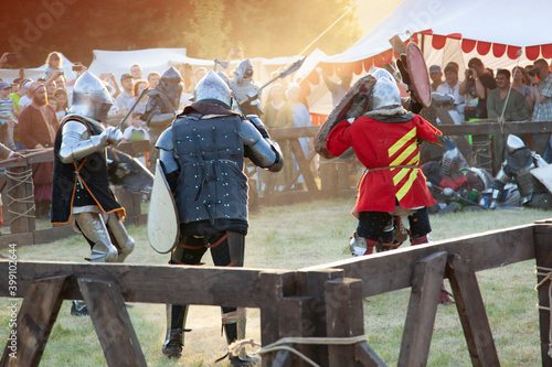 Medieval Knights With Swords On Battlefield