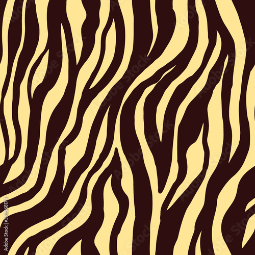 Zebra print with brown stripes and beige shades. Animal trendy print for printing on fabric, paper, wallpaper. Animal print with dark brown stripes on a beige background