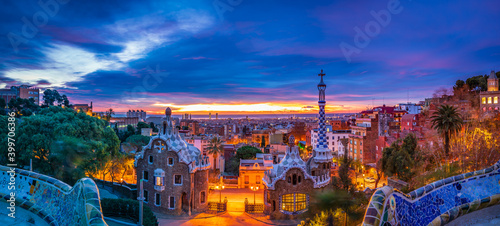 Sunrise in Barcelona seen from Park Guell. Park was built from 1900 to 1914 and was officially opened as a public park in 1926. In 1984, UNESCO declared the park a World Heritage Site