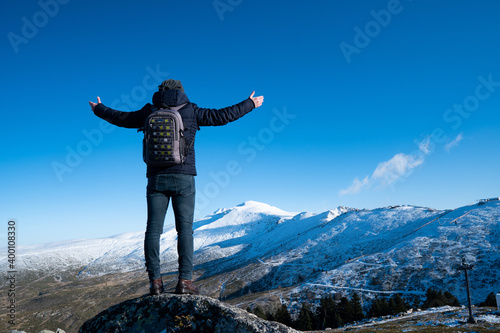 Freedom young man on mountain