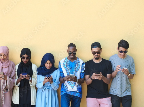 multiethnic startup business people group using smart phones