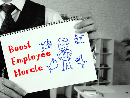 Conceptual photo about Boost Employee Morale with handwritten text.