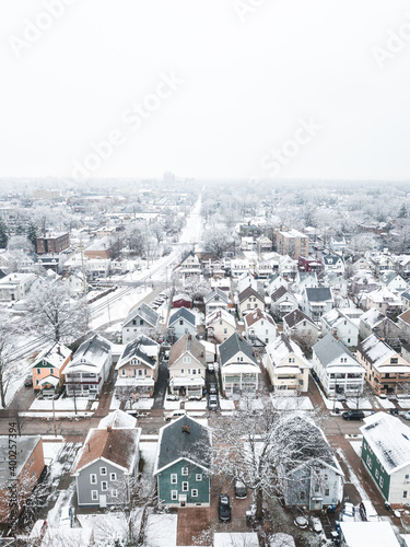 Lakewood Ohio homes and cleveland skyline in winter after a storm