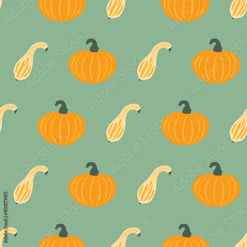 Repeat pattern with pumpkins on a green background.