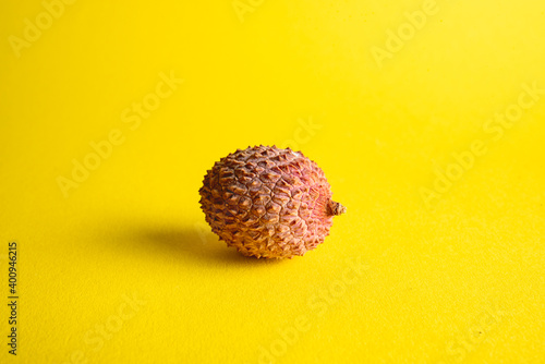 Litchie on yellow background