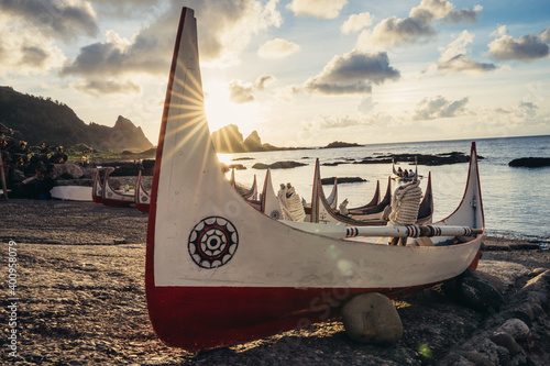 The traditional canoe of the aboriginal Tao tribe, with totem on it, during sunrise in Taiwan. The traditional canoes are known as "tatala" in Lanyu or Orchid island.