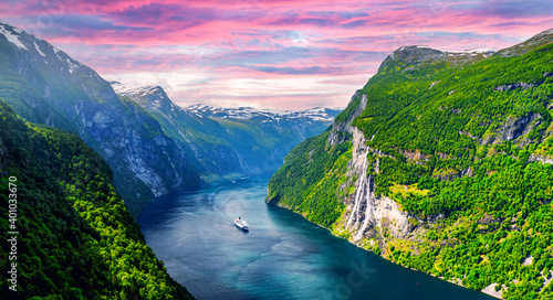 Panorama of breathtaking view of Sunnylvsfjorden fjord and famous Seven Sisters waterfalls, near Geiranger village in western Norway. Landscape photography