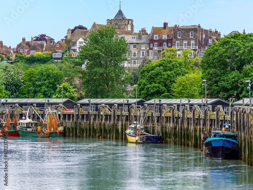 A view of boats moored on the River Rother in the town of Rye, Sussex