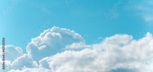 Panorama of blue sky with white cumulus clouds