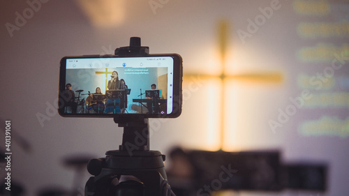 Church services online with new normal concept, Live worship with smartphone.