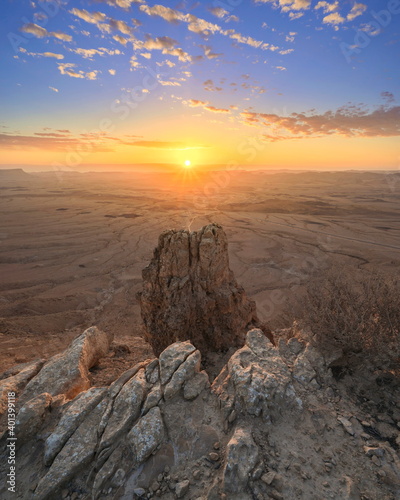 Beautiful landscape with cloudy sunrise over Machtesh Ramon (Ramon Crater), Negev Desert, Israel