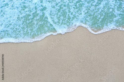 Beautiful ocean waves on the sandy beach Abstract style nature background pastel tones