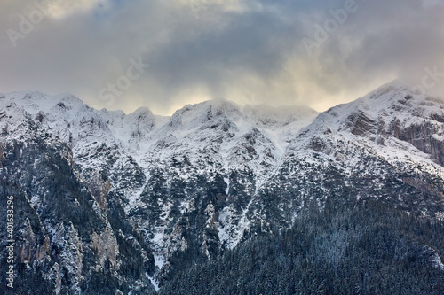 Winter landscape with rocky mountains
