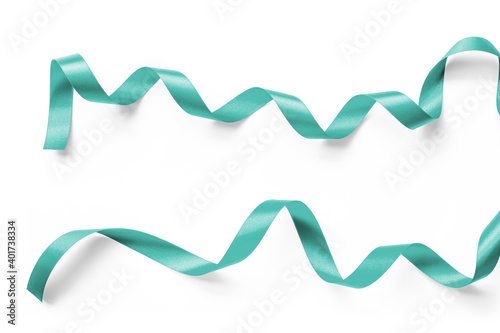 Teal green blue satin ribbon bow scroll set isolated on white background with clipping path for holiday and wedding card confetti design decoration