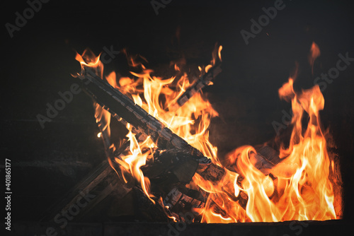 Burning fire in the fireplace abstract background.