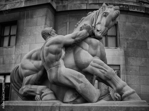 Man Controlling Trade. Equestrian statue created by Michael Lantz for the Apex Building in Washington DC under the WPA Federal Art Project. Dedicated in 1942. Limestone. Black and White