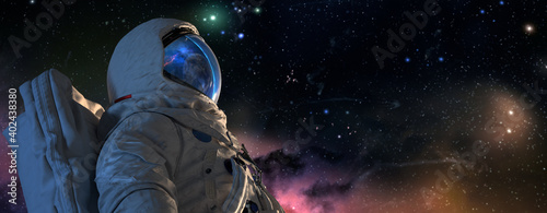 An astrounaut spaceman in outer space closeup shot