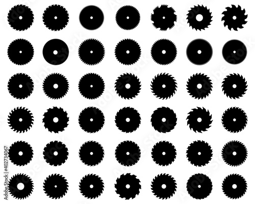 Black silhouettes of circular saw blades on white background 