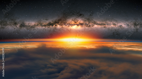 View of the planet Earth from space during a sunrise, milkyway galaxy in the background"Elements of this image furnished by NASA