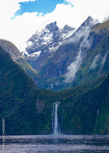 New Zealand, South Island, amazing waterfall and mountains in the Milfort Sound.