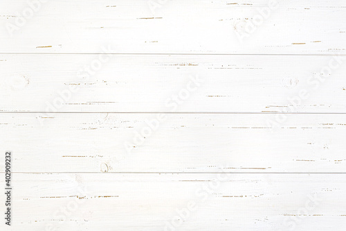 Universal background from white painted boards. A ready-made light background for flat lay and other design ideas. White plank floor or wall in retro style. Copy space.