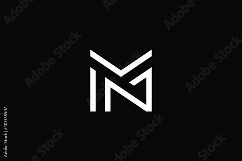 NM logo letter design on luxury background. MN logo monogram initials letter concept. NM icon logo design. MN elegant and Professional letter icon design on black background. M N NM MN