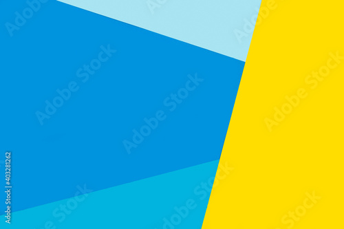 Fondo de composición de geometría de papel de color azul y amarillo abstracto. Vista superior. Copy space