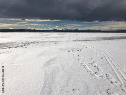 Beautiful Clouds over the frozen lake, Cherry creek state park, Colorado.