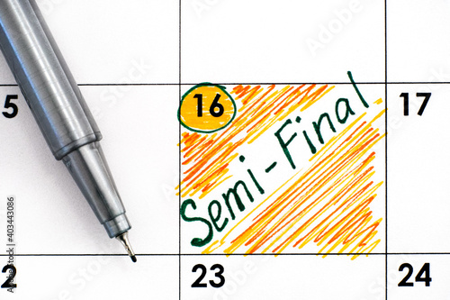 Reminder Semi-Final in calendar with pen.